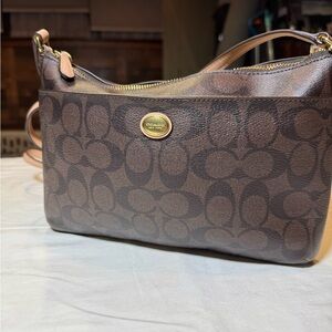 Coach Peyton Signature East West Swingpack crossbody bag